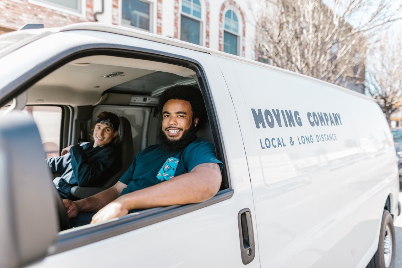 two movers waiting to help people to avoid common mistakes when moving in Cincinnati