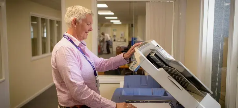 How to Ensure a Tech-Safe Move for Your Cincinnati Office 2 printing papers in aging center