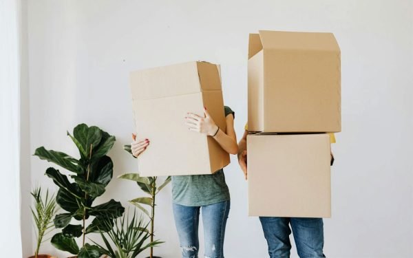 a couple with moving boxes