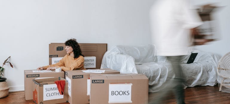 a woman thinking about how to pack furniture when moving