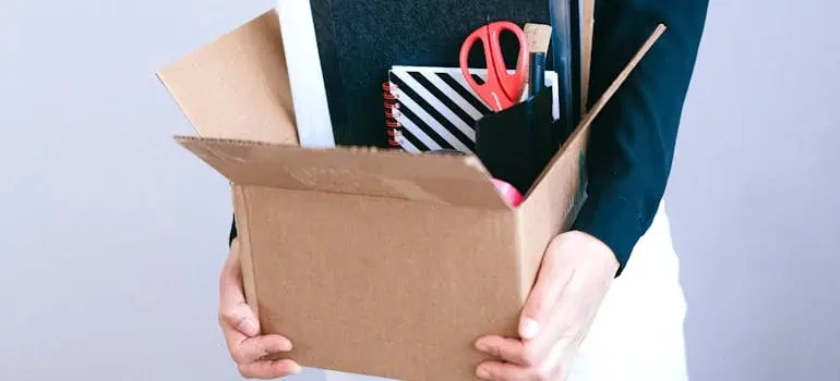 The ultimate office move checklist for Ohio businesses 1 employee preparing an office move checklist