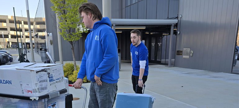 two ready 2 roll moving workers