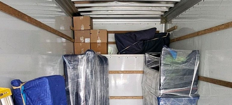 Packed moving truck ready for winter relocation in Ohio