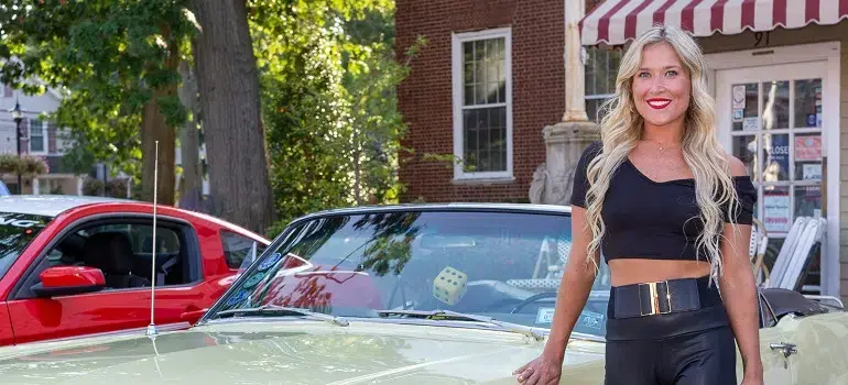 10 things to do after you move 3 Woman with car doing some of the things to do after you move