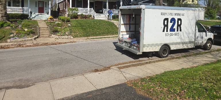 A practical guide for a relocation from Hamilton to Fairfield 2 Box truck parked in front of a home