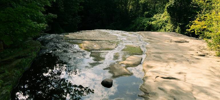 The best places in Ohio for outdoor enthusiasts 7 Smooth rock stream in shaded forest area