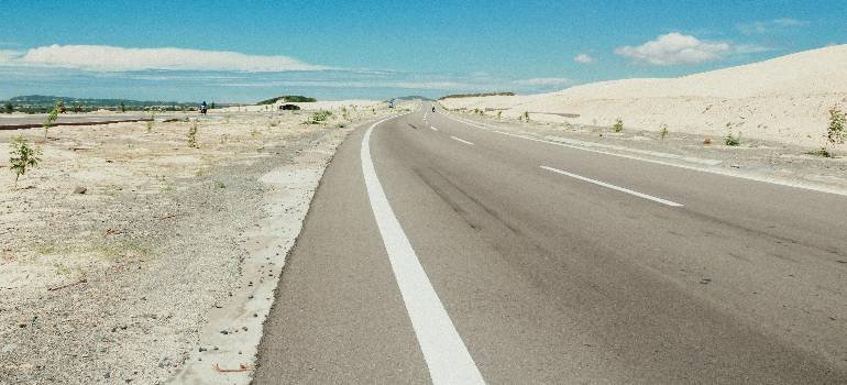 Pros and cons of living near US 22 7 a gray road on a clear day
