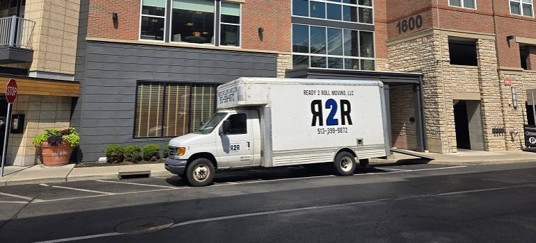 Ready 2 Roll Moving Ohio truck parked outside an apartment building.