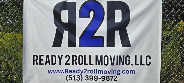 Reading Movers 3 R2R sign with contact details