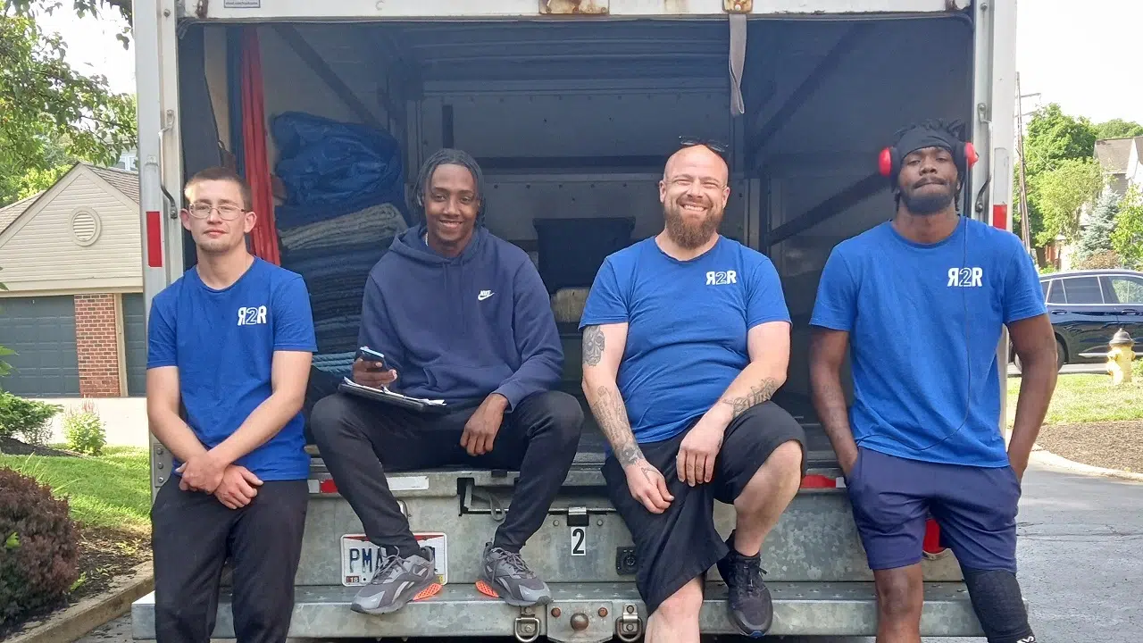 Ready 2 Roll moving crew by loaded truck
