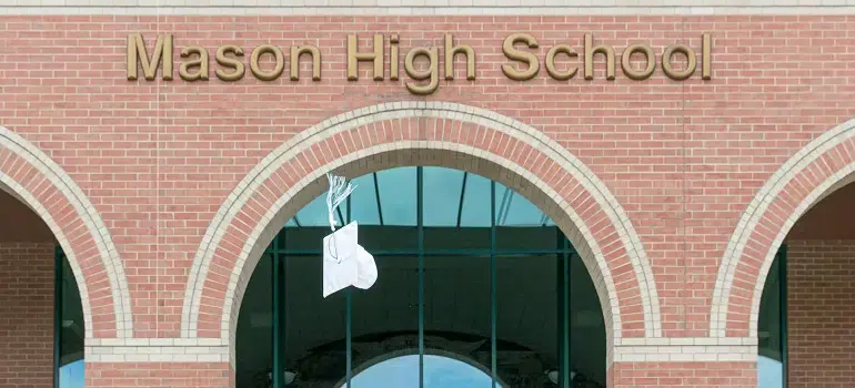 Township vs city living: What are the main differences? 1 Mason High School building near new neighborhood