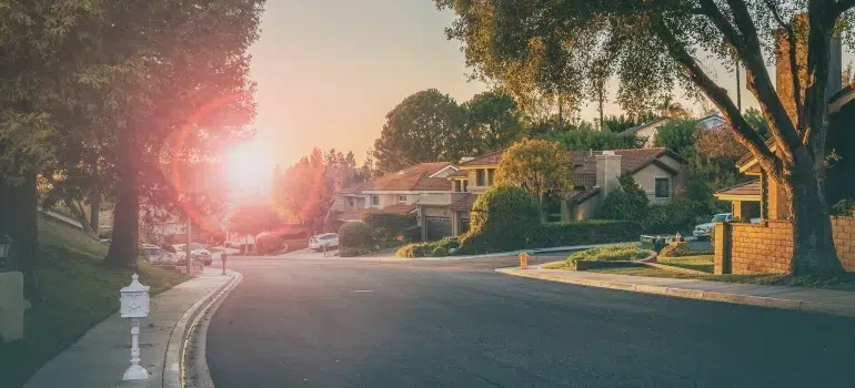 A peaceful suburban street at sunset