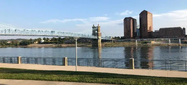 Is Cincinnati a good place to live? 1 View of the John A. Roebling Suspension Bridge and skyline for people asking is Cincinnati a good place to live