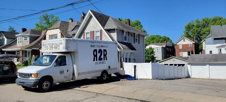 Essential guide for moving to Sharonville OH 6 R2R moving truck parked outside Cincinnati homes