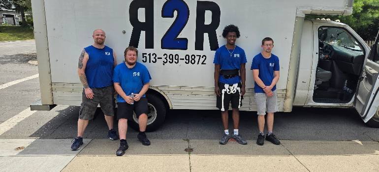 Essential guide for moving to Sharonville OH 7 R2R team beside moving truck in Cincinnati