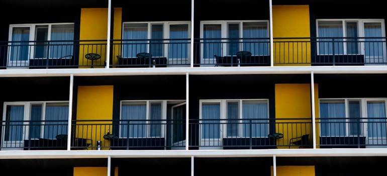 Over-the-Rhine apartments: 5 costly moving mistakes to avoid 2 Apartment balconies with yellow exterior walls