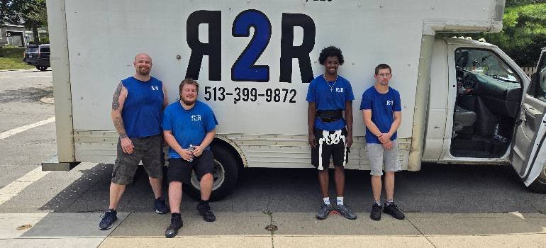 What’s the average cost of moving to another state? 1 Ready 2 Roll moving crew beside branded truck
